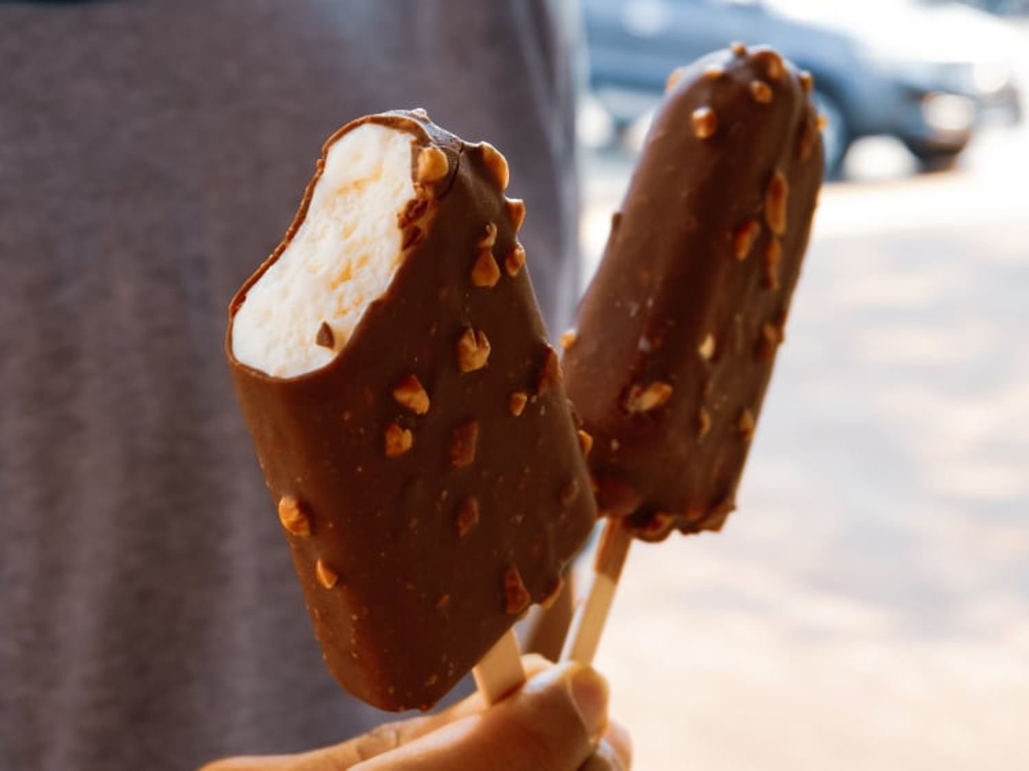 Hand holding two ice cream bars