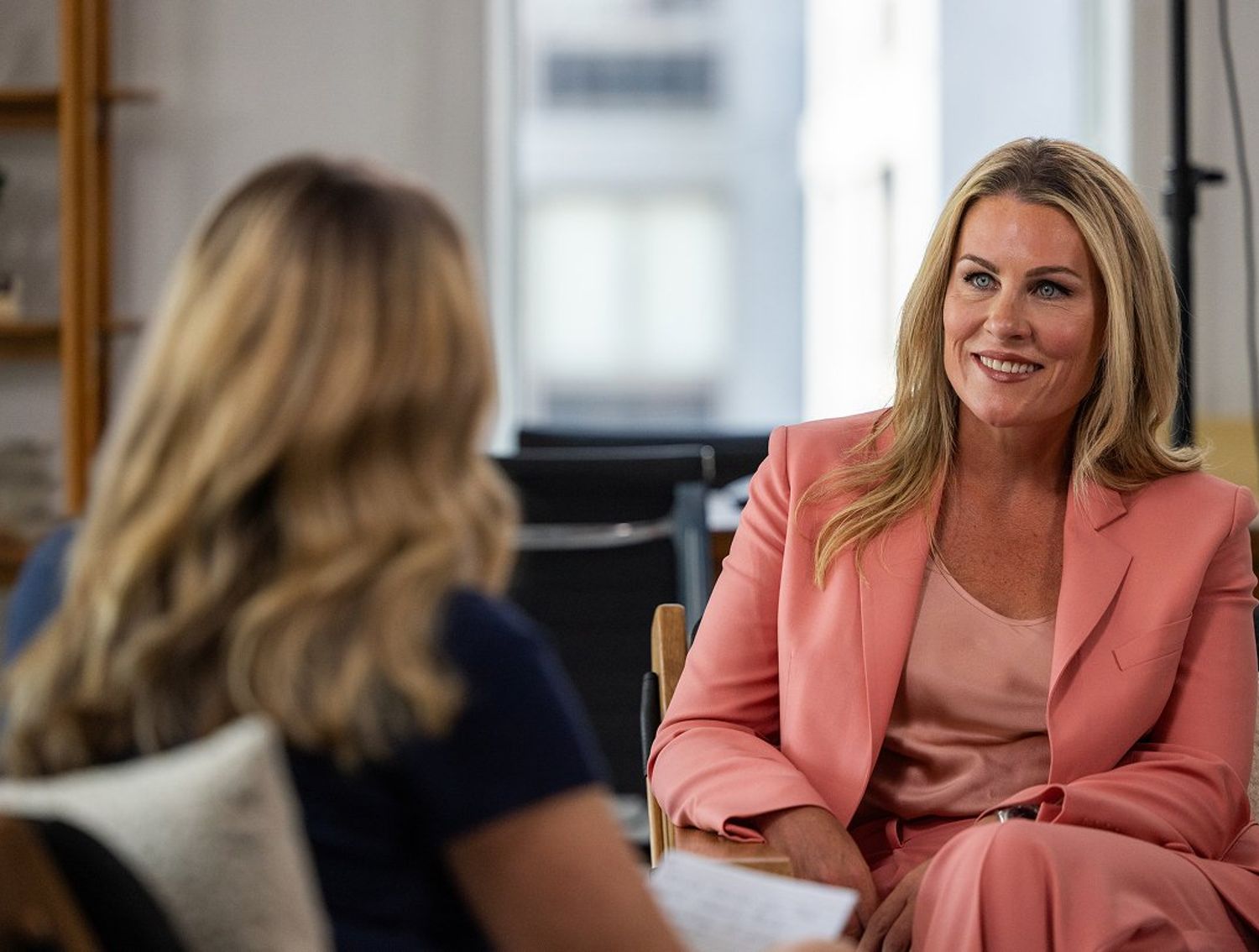 Two women interviewing each other