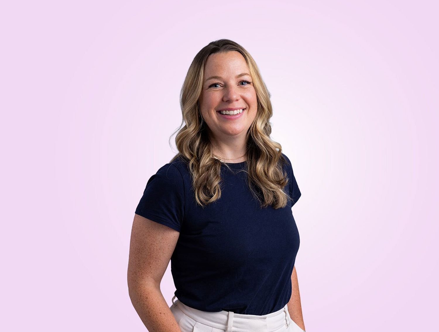 The Trade Desk employee in front of purple background