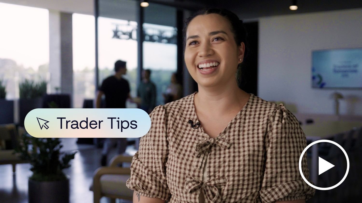 Photo of Marjorie Panknin, an industry trader, smiling at the camera with a Trader Tips logo and play button overlaid