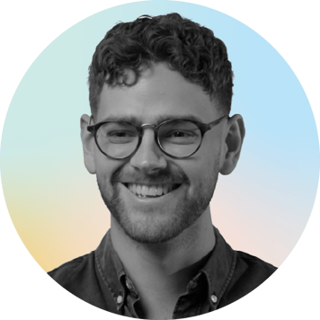 Photograph of William Owles, a trader at The Trade Desk, smiling at the camera.