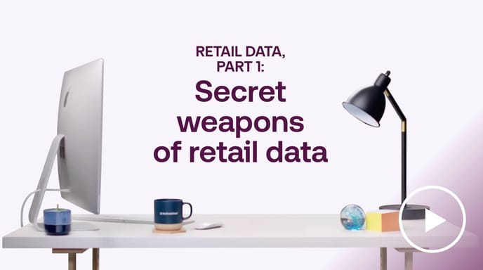 Desk with computer and lamp beside ‘Secret weapons of retail data’ text by The Trade Desk, illustrating retail data marketing.