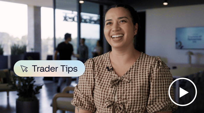Photo of Marjorie Panknin, an industry trader, smiling at the camera with a Trader Tips logo and play button overlaid