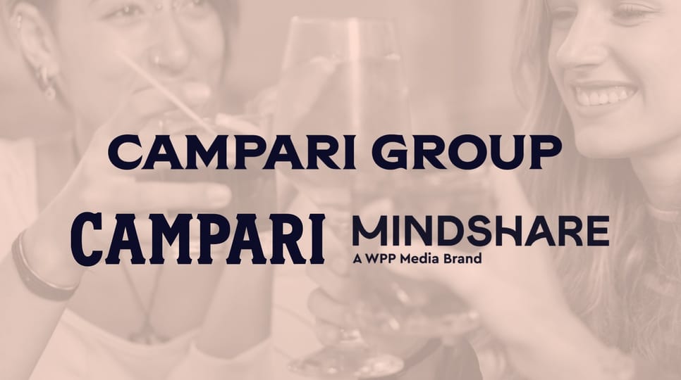 Overlay text reading “Campari Group” and “Campari Mindshare, a WPP Media Brand” displayed over a background of people toasting with cocktails.