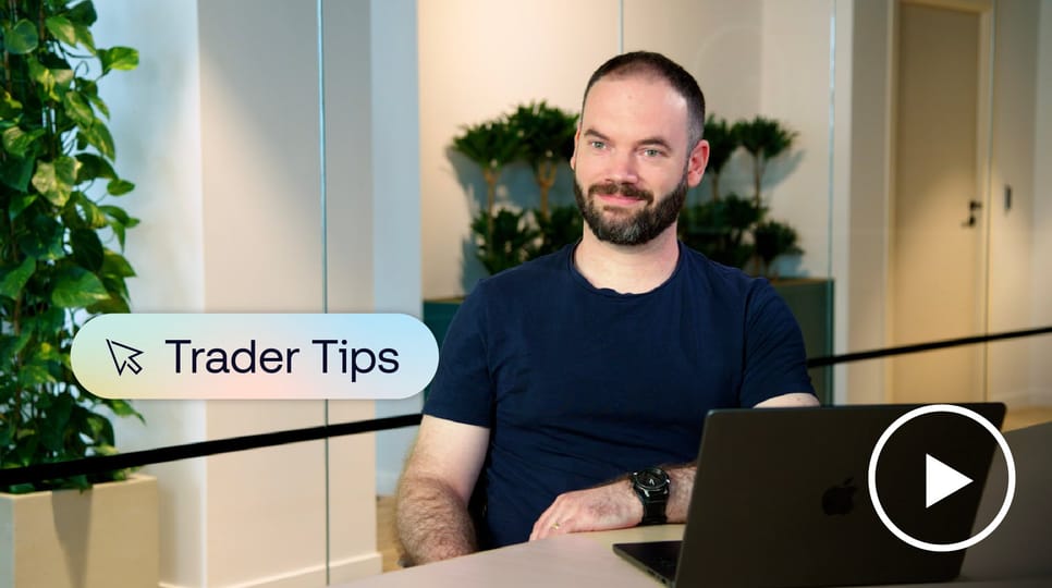 Trader Tips Geoffery QRI Video Still with white play button in the corner