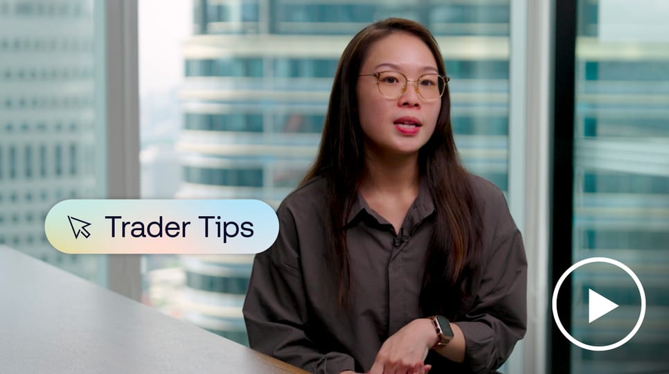 Yan Zhen Tan, Trader, The Trade Desk  seated at a desk looking at the camera during an interview.