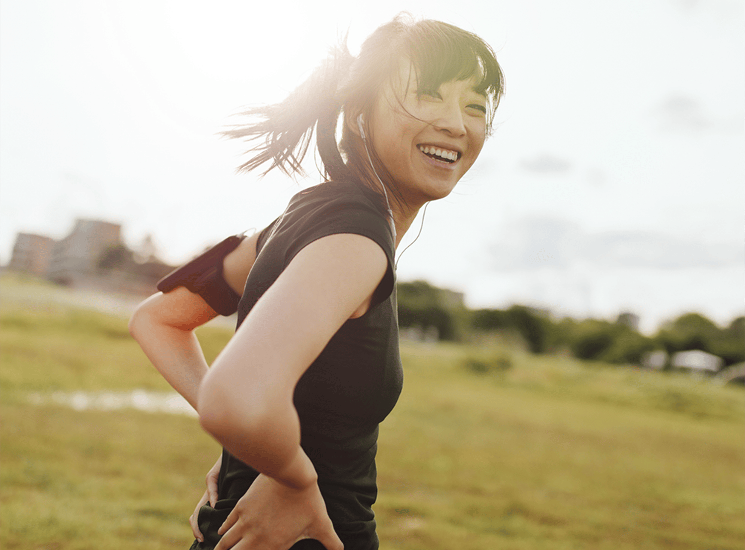 Woman outside, smiling