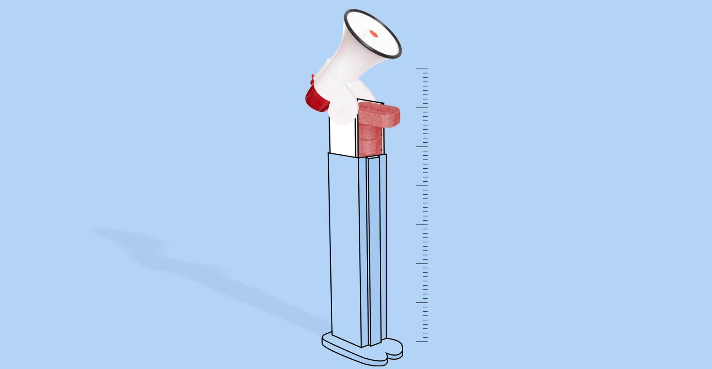 A red pill dispenser topped with a blow horn stands beside measuring lines.