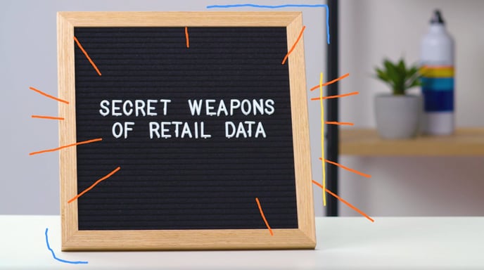 Bulletin board with the words "Secret Weapons of Retail Data"