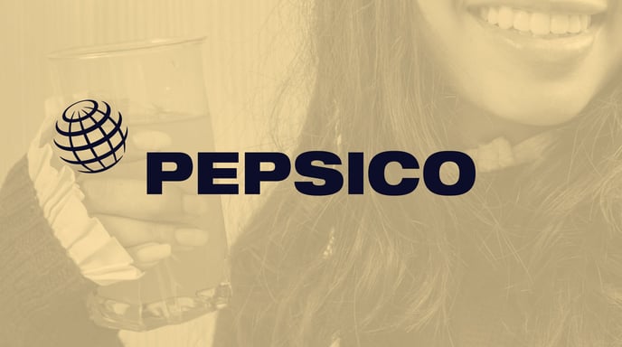 A woman smiles while holding a glass of orange-colored beverage, overlaid with the PepsiCo logo.