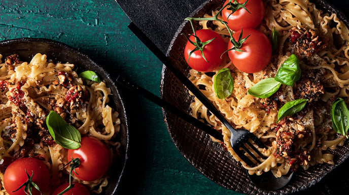 Two plates filled with pasta