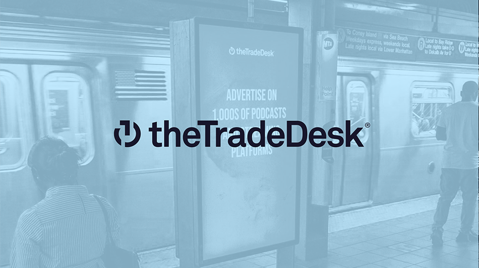 A stylized image shows The Trade Desk's logo overlaid on a New York City subway platform ad promoting podcast and streaming platform advertising.